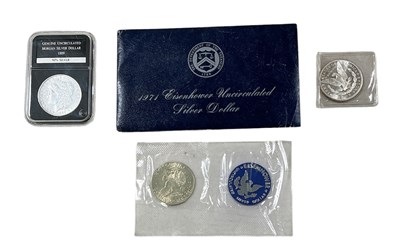 Lot 1503 - Three USA silver and other dollars, comprising...