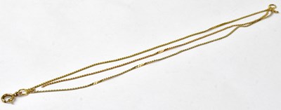 Lot 904 - A 9ct yellow and white gold three-strand chain...
