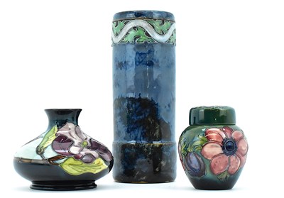 Lot 139 - MOORCROFT; a lidded ginger jar in 'Anemone' on...
