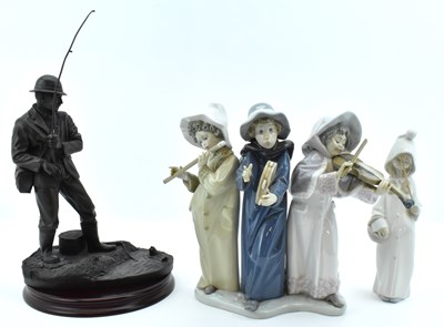 Lot 113 - LLADRÓ; a porcelain figure group of three...