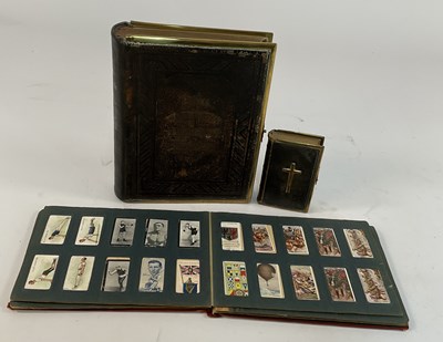 Lot 336 - The Holy Bible containing the Old and New...