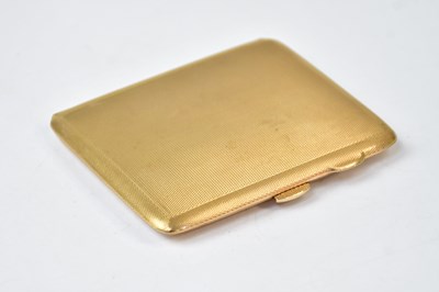Lot 969 - A 9ct yellow gold cigarette case, with engine...