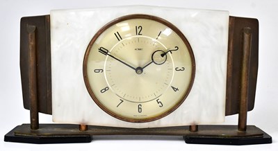 Lot 80 - METAMEC; an Art Deco brass mounted mantel...