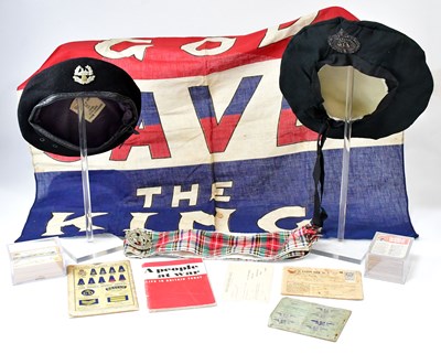 Lot 657 - A mixed lot of military themed collectables,...