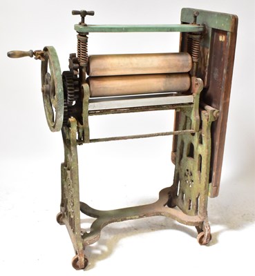 Lot 276 - A vintage Sunbeam mounted mangle on a cast...
