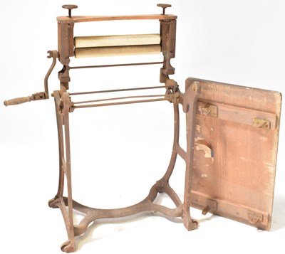 Lot 274 - A vintage folding cast iron mangle with wooden...