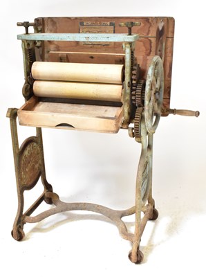 Lot 278 - A Lewis's Ltd Standex cast iron foling mangle,...