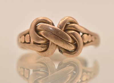 Lot 1314 - A 9ct yellow gold 'knot' ring (cut), approx...