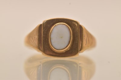 Lot 1315 - A 9ct yellow gold white hardstone set signet...