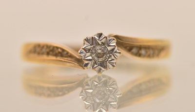 Lot 1320 - A 9ct yellow gold diamond solitaire ring, the...