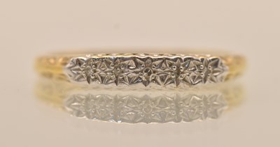 Lot 1341 - A 9ct yellow and white gold diamond five stone...