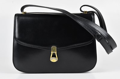 Lot 1381 - GUCCI; a vintage old Gucci calfskin black...