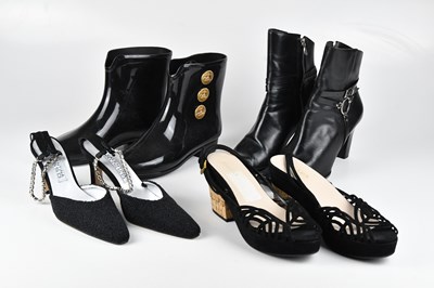 Lot 1451 - PRADA; a pair of black suede wedge platform...