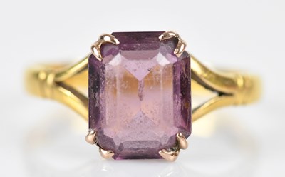 Lot 499 - A 22ct yellow gold dress ring set with an...