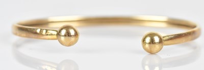 Lot 63 - A 9ct yellow gold bangle, approx 5.2g.