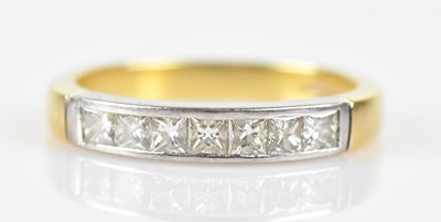 Lot 404 - An 18ct yellow and white gold diamond set...