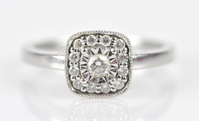 Lot 405 - An 18ct white gold diamond set cushion shaped...