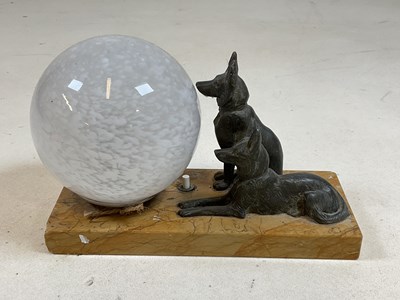 Lot 644 - An Art Deco style lamp with German shepherd dogs