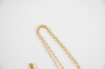 Lot 9 - A 9ct yellow gold cross pendant suspended on a...