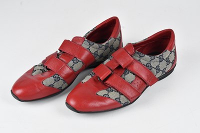 Lot 1443 - GUCCI; a pair of vintage Gucci GG monogram...