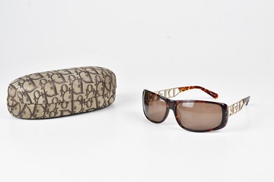 Lot 1263 - CHRISTIAN DIOR; a pair of Indinight shield...