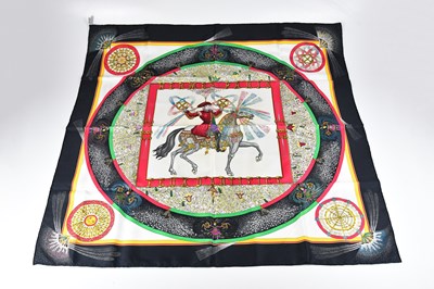 Lot 1255 - HERMÈS; a 100% silk twill black, red, yellow...