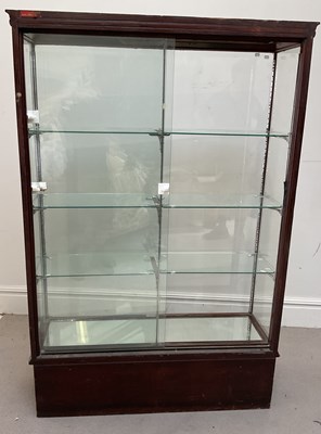 Lot 1328 - A glass display cabinet