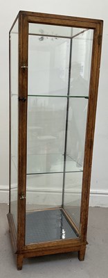 Lot 1002 - An early 20th century oak framed shop...