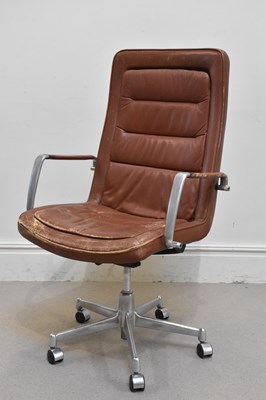 Lot 1027 - JOEGEN KASTHOM, KUSH & CO; a brown leather...