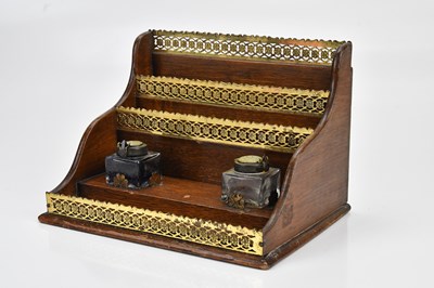 Lot 2034 - An Edwardian mahogany letter rack, with two...