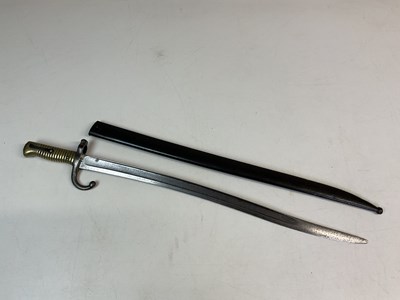 Lot 108 - A French Chassepot brass handled bayonet with...