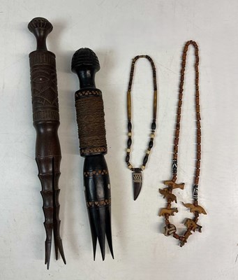 Lot 99 - Two Oceanic islands cannibalism forks, one...