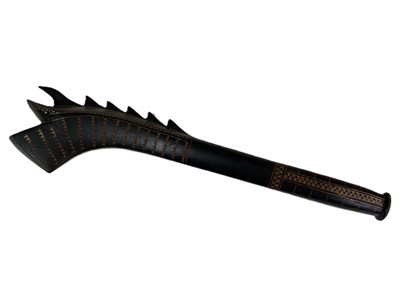 Lot 37 - A Polynesian war club with tribal decorations,...