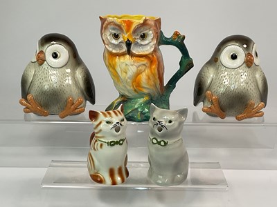 Lot 181 - FITZ AND FLOYD; a pair of ceramic bookends in...