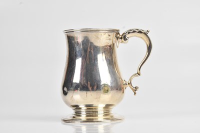 Lot 457 - BARNARDS; a Victorian hallmarked silver mug...