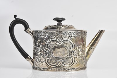 Lot 496 - A George III hallmarked silver teapot, with...