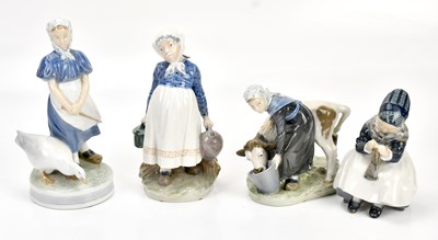 Lot 1451 - ROYAL COPENHAGEN; a calf and milking girl...