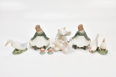 Lot 1472 - ROYAL COPENHAGEN; a pair of figures of a...
