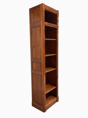 Lot 1034 - A modern tall mahogany library bookcase, of...