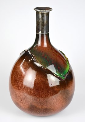Lot 1437 - BRETBY; a large bottle vase with white metal...