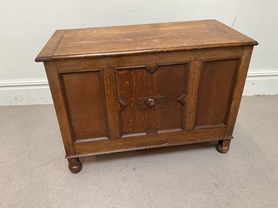 Lot 1080 - An 1920s oak coffer, height 67cm, width 92cm,...