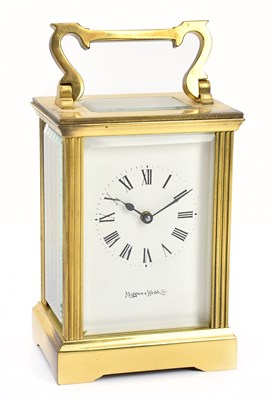 Lot 1381 - MAPPIN & WEBB; a modern brass carriage...