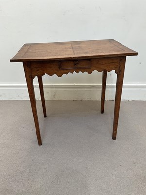 Lot 1066 - A late George III oak side table, with drawer,...