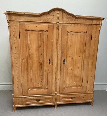 Lot 1185 - A large French pine armoire, with two panelled...