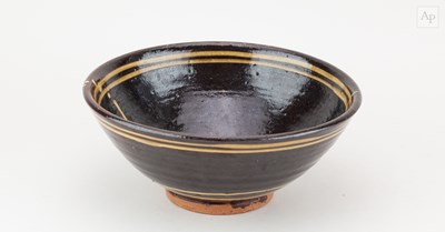 Lot 144 - CLIVE BOWEN (born 1943); a slipware bowl with...