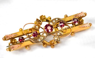 Lot 913 - A Victorian 9ct yellow gold brooch set with...