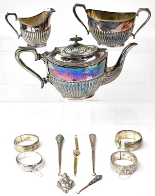Lot 803 - Three hallmarked silver hinged bangles, a...