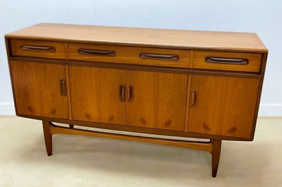 Lot 625 - G PLAN; a 'Fresco' range teak sideboard, with...
