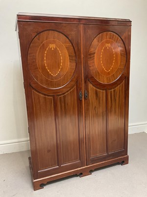 Lot 1240 - A W LYN; an Edwardian inlaid mahogany wardrobe...