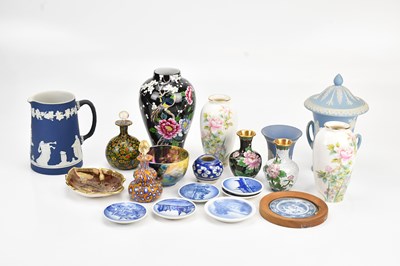 Lot 1555 - WEDGWOOD; a twin handled lidded vase, height...